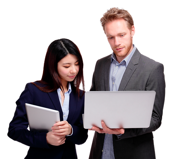 Two professionals looking at a laptop screen, discussing work-related matters.